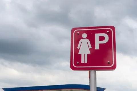 Lady parking zone on blue sky background Stock Photos
