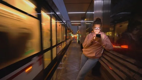 Lady passenger waiting on bus stop Stock Footage 272417890