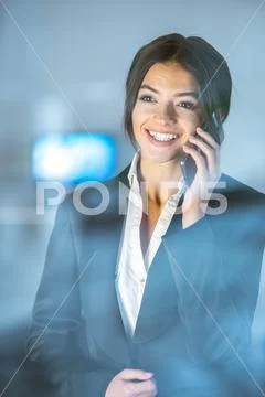 The lady phone over the window Stock Photos