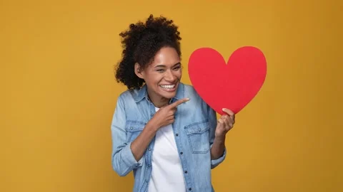 Lady point big heart postcard send air kiss isolated vivid color background Stock Footage 167553734