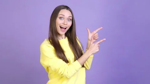 Lady point empty space incredible promo isolated bright color background Stock Footage 169996943