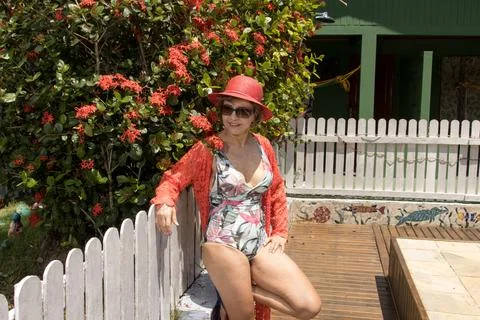 Lady by the pool Stock Photos