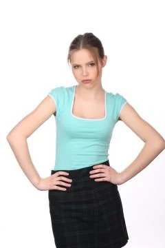 Lady posing with hands on her hips. Close up. White background Stock Photos