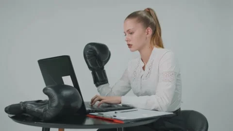 Lady is preparing to go boxing before she is learning how to fight right. Stock Footage 157936989