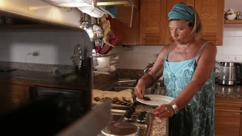 Lady preparing lunch Stock Footage 134744303