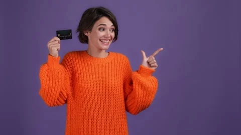 Lady present debit card point empty space isolated vibrant color background Video stock 169361285