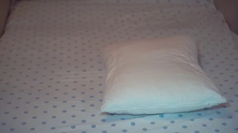 Lady put the pillowcase Stock Footage 85281274
