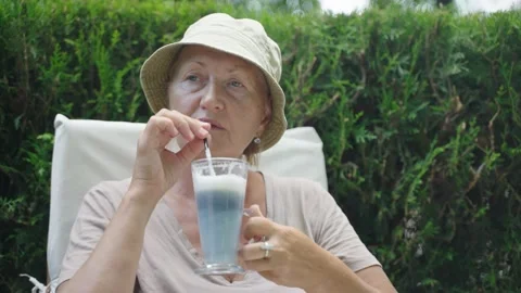 Lady on retirement drinking tea Stock-Footage 213267689