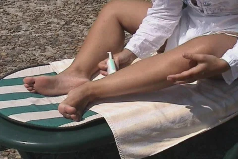 Lady shaving legs Stock Footage 105817