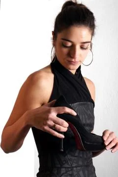 Lady with shoe Stock Photos