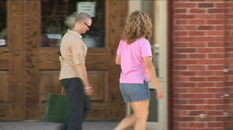 Lady shoppers walk by Video stock 569192
