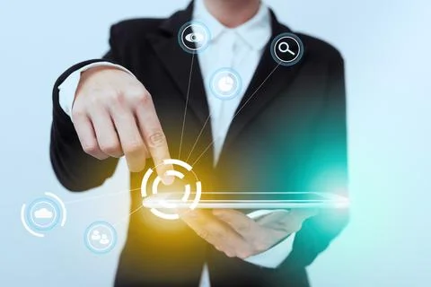 Lady In Suit Standing Pointing On Tablet Showing Futuristic Graphic Interfa.. Stock Photos