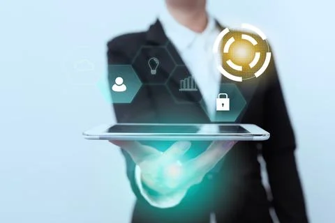 Lady In Suit Standing Presenting Mobile Device Futuristic Interface Technol.. Foto stock