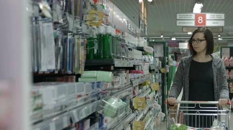 Lady in a supermarket Stock Footage