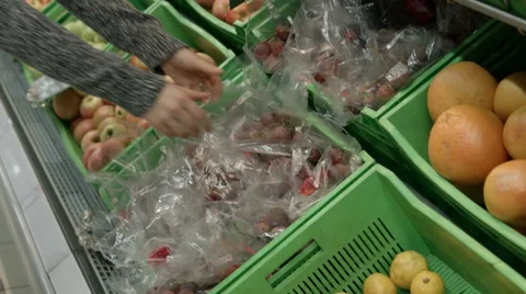 Lady in a supermarket Stock Footage 68016583