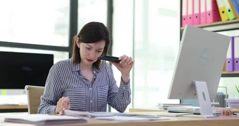 Lady takes photo of documents during working time in office Stock Footage 277685960
