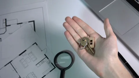 Lady taking house key from agent hand, favorable purchase and rental of housing Stock Footage 121587893
