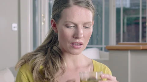Lady taking a sip of Herbal tea while at home. Stock Footage 63032467