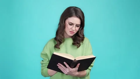 Lady throw book dislike difficult prepare exam isolated cyan color background 스톡 동영상 169944150