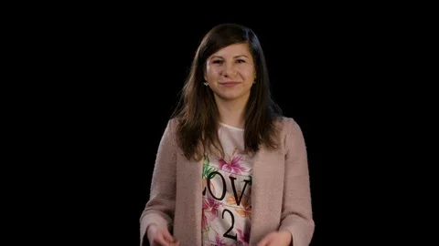 A Lady With Thumbs Up Against a Black Background Stock Footage 86579216