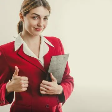 Lady thumbs up with tablet Stockfoto's