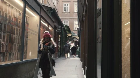 Lady traveller is looking for a location. looking and the map Stock Footage 87316212