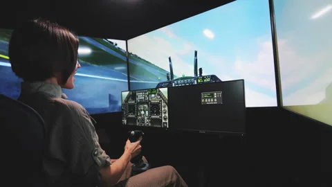 Lady trying to take off virtual plane in... | Stock Video | Pond5