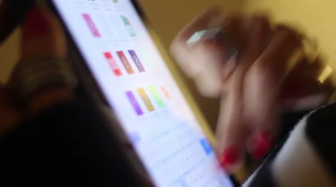 Lady typing on her Tablet Stock Footage 57687078