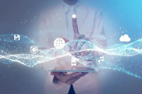 Lady In Uniform Side Standing Holding Tablet In Hand Virtually Toching On S.. Stock Photos