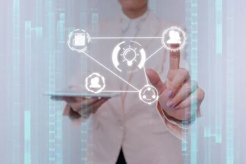 Lady In Uniform Touching Different Application In Projected Hologram. Busin.. 库存照片