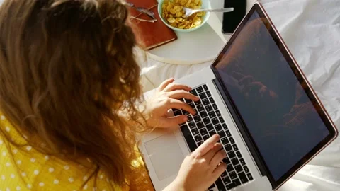 Lady use laptop while have breakfast in bed Video stock 167844884