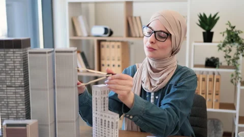 Lady using compass and laptop in architecture office Stock Footage 238030307