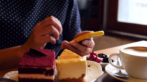 Lady using mobile phone in coffee shop Stock Footage 101035634