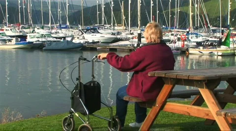 Lady with walking aid Stock Footage 262962