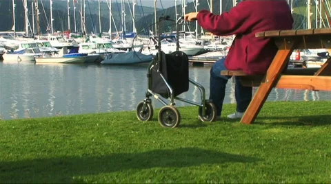 Lady with walking aid Stock Footage 263075