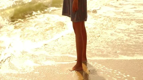 Lady walking on the beach Stock Footage 46098672