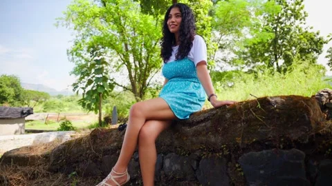 Lady while sitting relax looking around Stock Footage 295923617