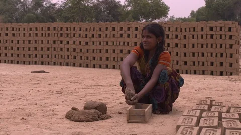 Lady worker making bricks- Shot on Sony FS7 動画素材 90896684