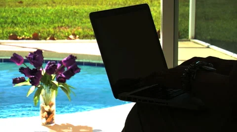  lady working by the pool on her Laptop Stock Footage 931146