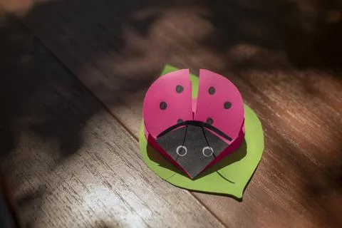 Ladybug made of paper. Children's creativity from colored paper. Stock Photos