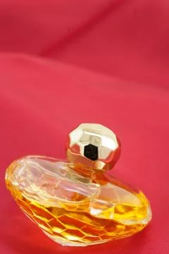 Ladys' golden perfume bottle Stock Photos