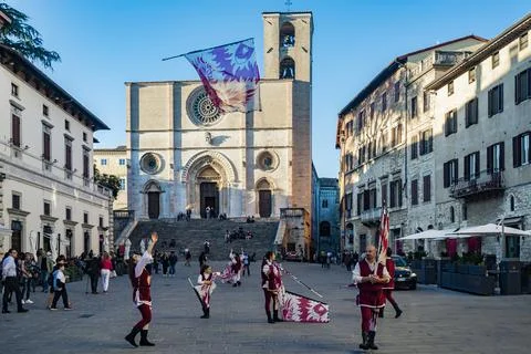 Lag wavers perform in procession through the streets of the center in Todi, U Stock Photos