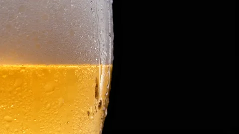 Lager Beer closeup. Beer isolated on black background. Stock Footage 164356232