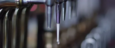 Lager pouring from tap Stock Footage 59946900
