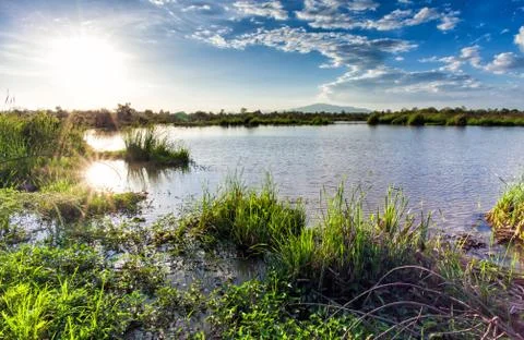 Lagoon with cloudy and sunset Stock Photos