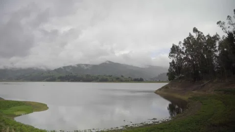 A lagoon surrounded by mountain in the valley of Video stock 277468900