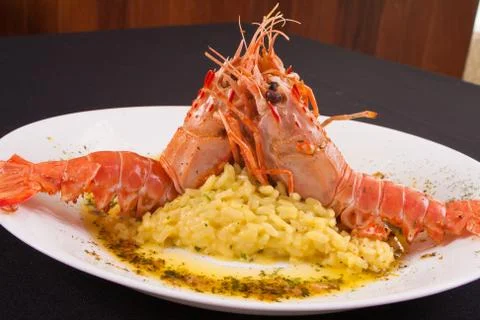 Lagostin with risotto Stock Photos