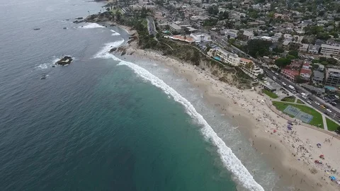 Laguna Beach Cloudy Day - High Fly at Angle Toward Shore Video stock 93643513
