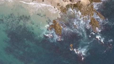 Laguna Beach Cloudy Day - High Descent Downwards to Rocks Stock Footage