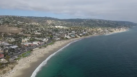 Laguna Beach Cloudy Day - High Fly Slow Pan Down Video stock 93645676